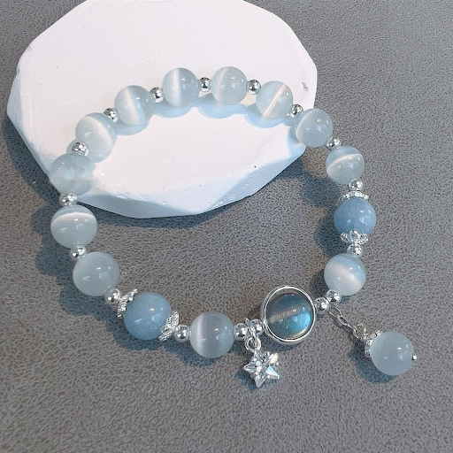 Vòng tay đá thạch anh trắng, hồng charm ngôi sao - ảnh 1