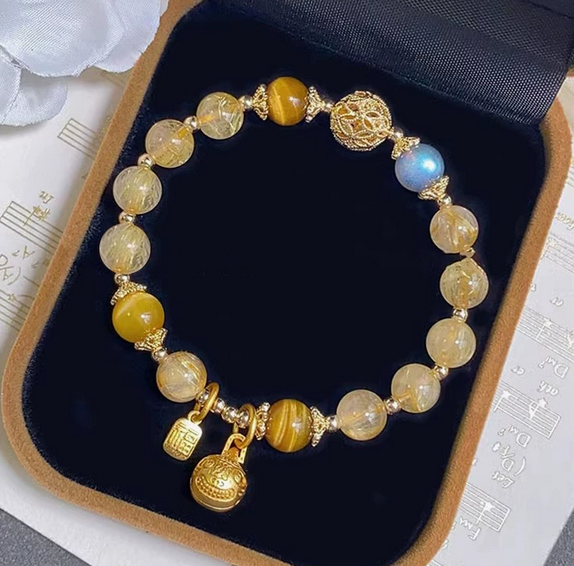 Vòng tay thạch anh tóc vàng, mắt hổ charm lục lạc - ảnh 2